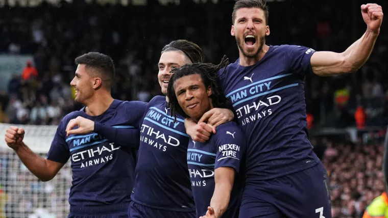 Nathan Ake (second from right) leads Manchester City celebrations against Leeds United