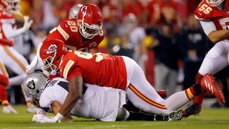 Chris Jones and Derek Carr