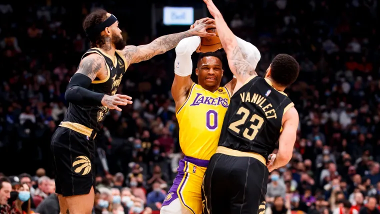 Gary Trent Jr. and Fred VanVleet defend Russell Westbrook