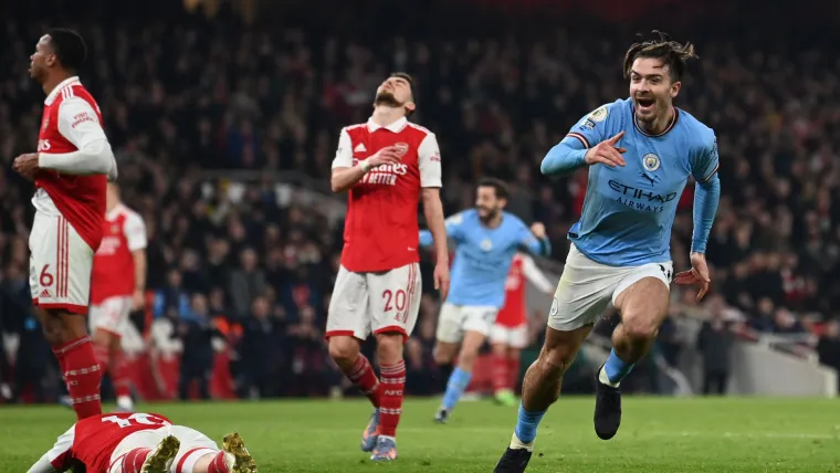 Jack Grealish celebrates at Arsenal