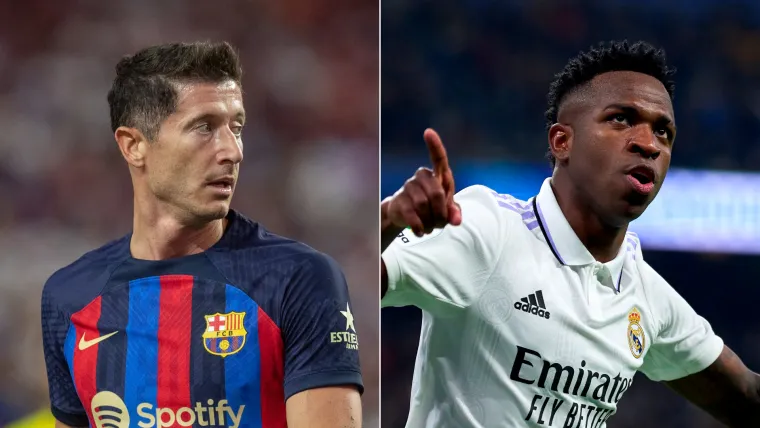 Robert Lewandowski of Barcelona and Vinicius Jr of Real Madrid split