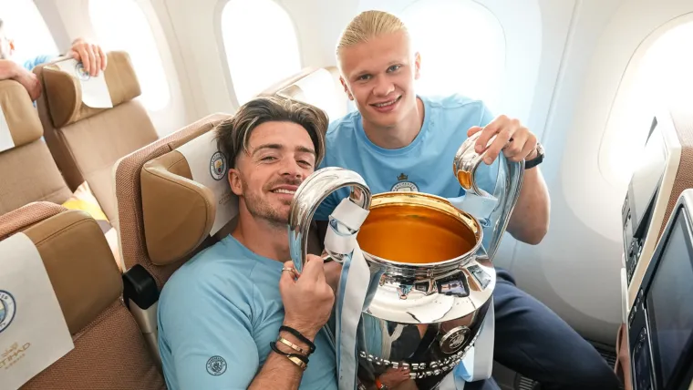 Jack Grealish and Erling Haaland