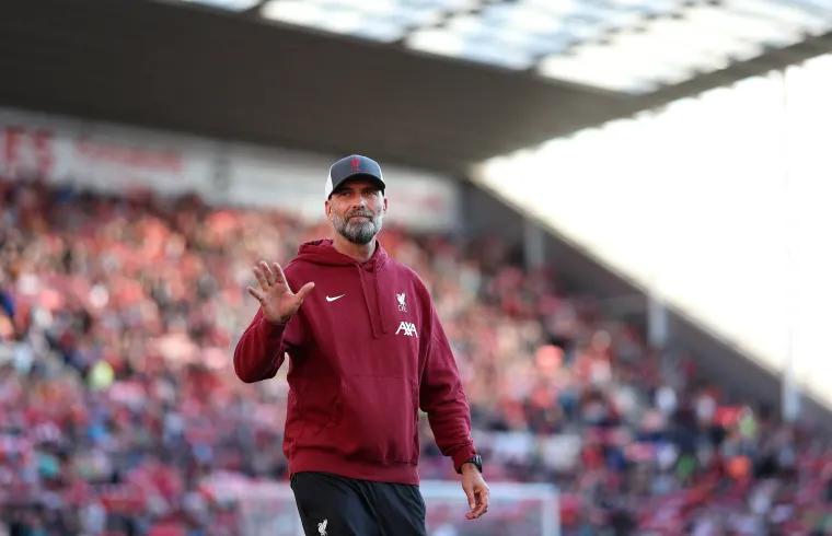 Jurgen Klopp waving to Liverpool fans