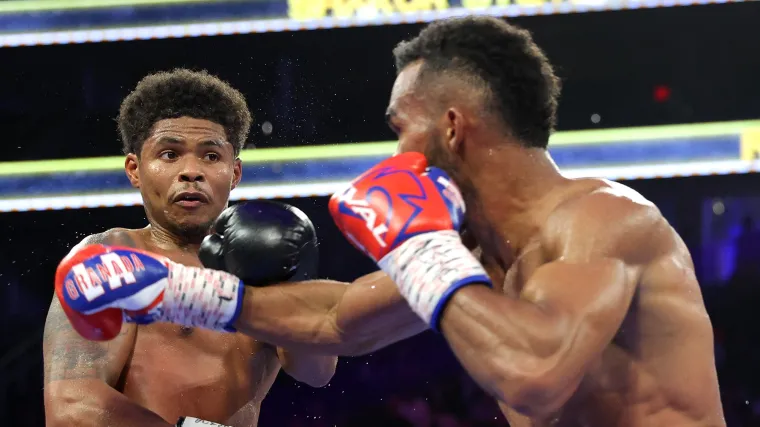 Shakur Stevenson avoids a shot from Edwin De Los Santos