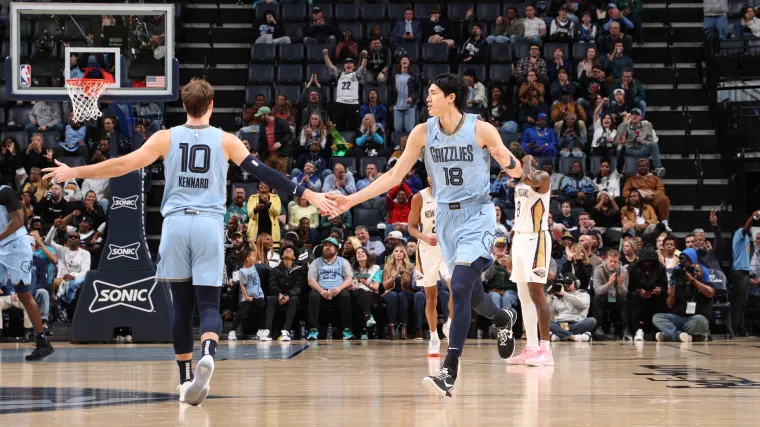 Yuta Watanabe high-fiving teammate Luke Kennard